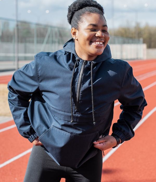 Woman feeling energized and happy during a light cardio workout.